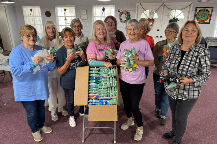 Community volunteers assembling Chemo Care Kits together